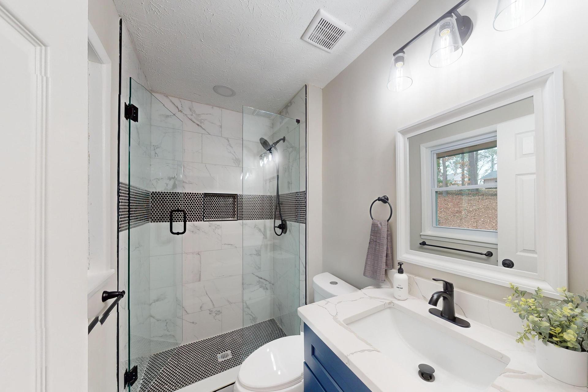 Luxury Private Bathroom with a window