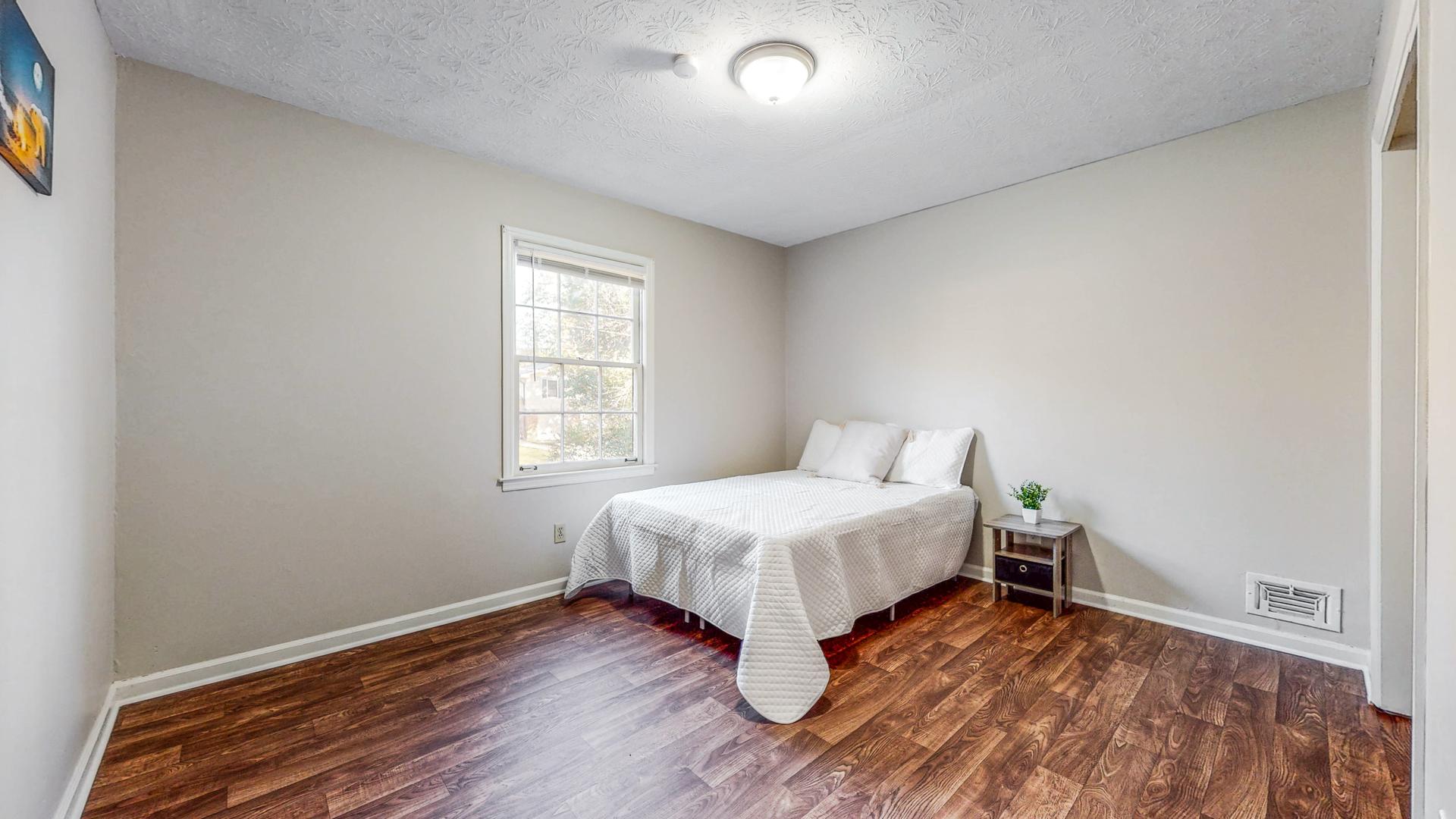 bedroom, detected: window blind, bed