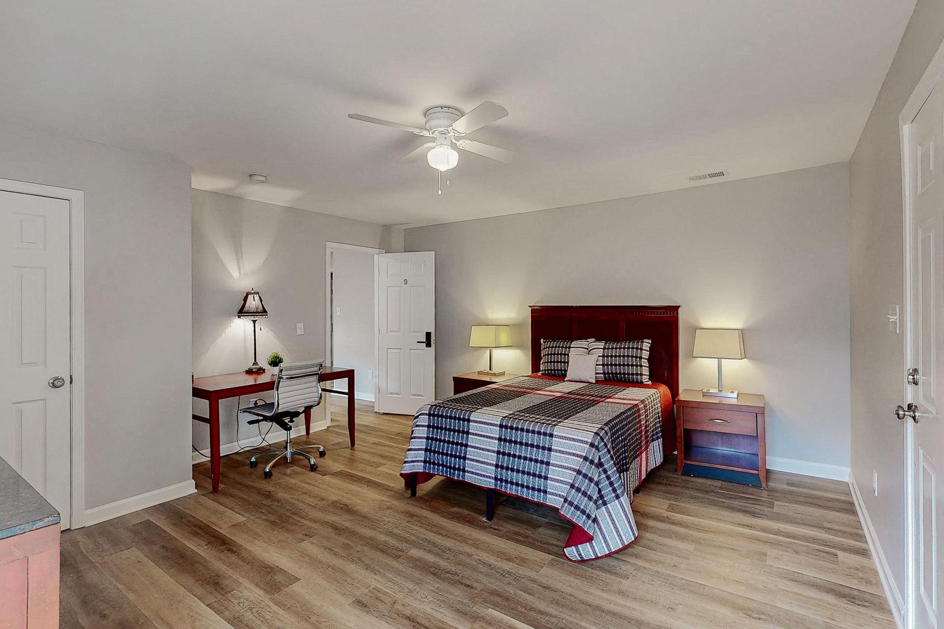 HUGE Upstairs Bedroom 9 with desk and balcony.