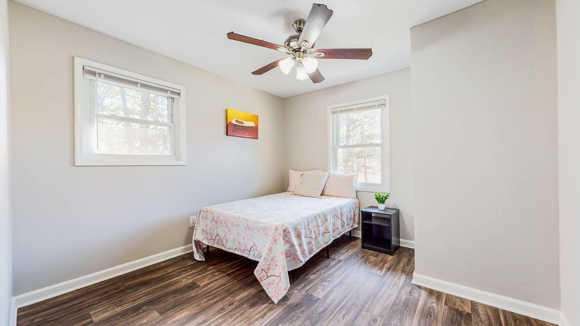 bedroom, detected: ceiling fan, window blind, bed