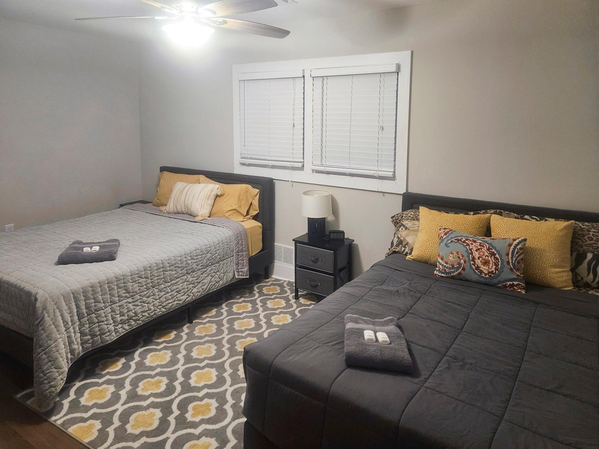 bedroom, detected:bed, window blind, ceiling fan