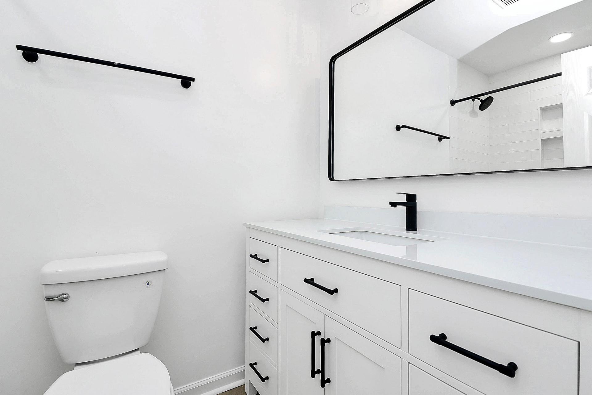 Large vanity with modern finishes.