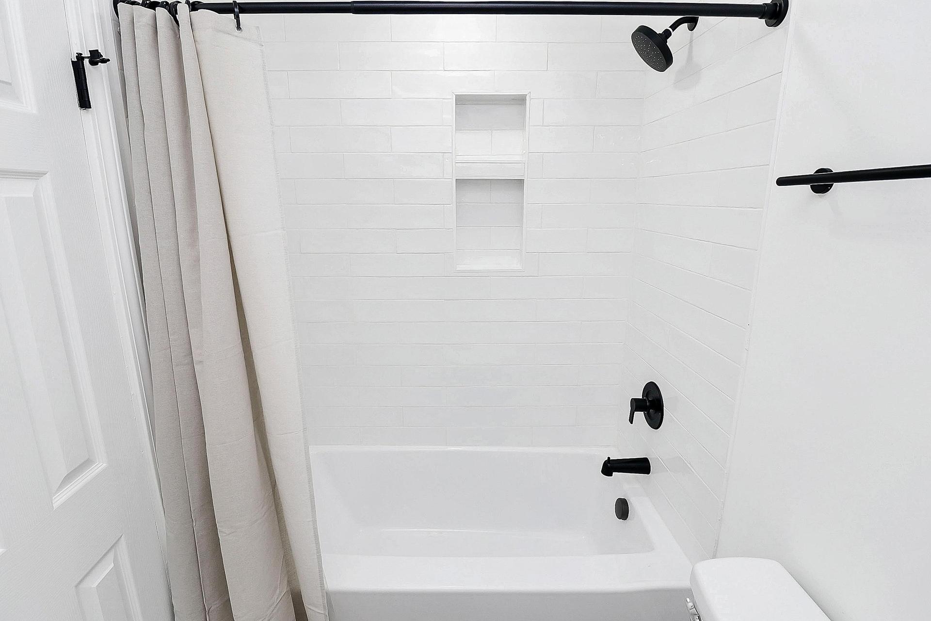 Newly renovated soaking tub and shower.