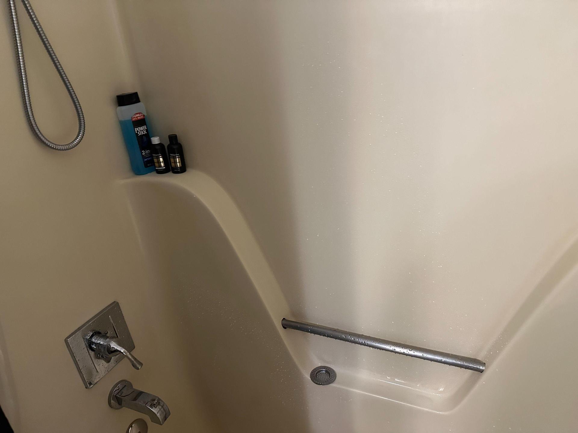 Your shower bathtub combo features hand held power shower head.