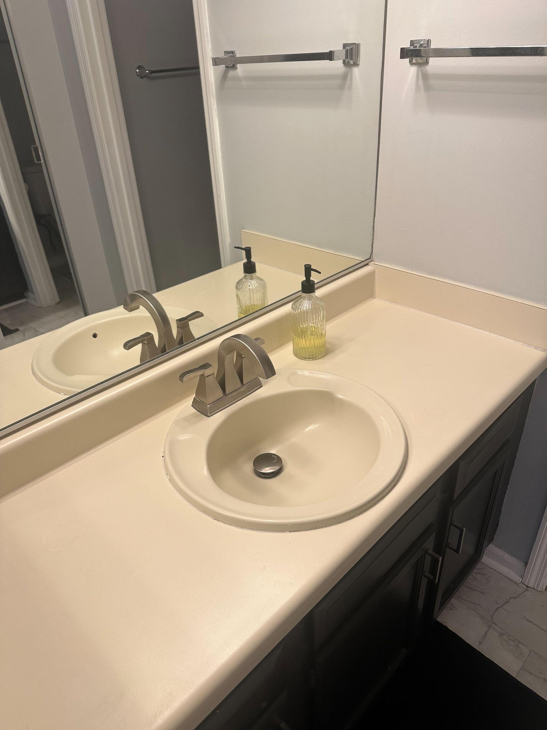 Your sink has extra storage in the cabinet and separate medicine cabinet.