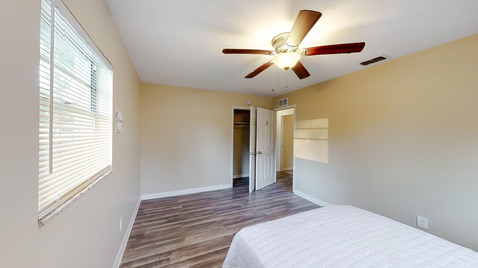 bedroom, detected: ceiling fan, window blind, bed