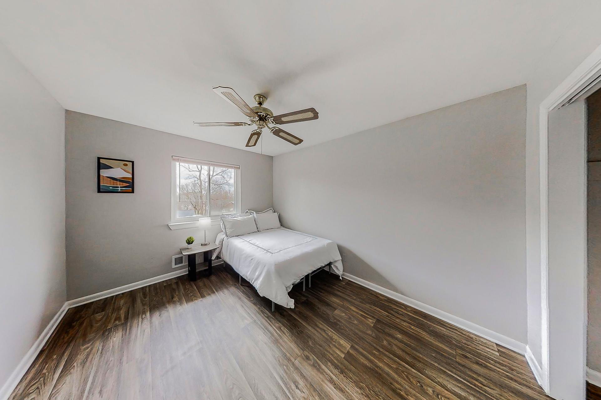 bedroom, detected: ceiling fan, bed, window blind