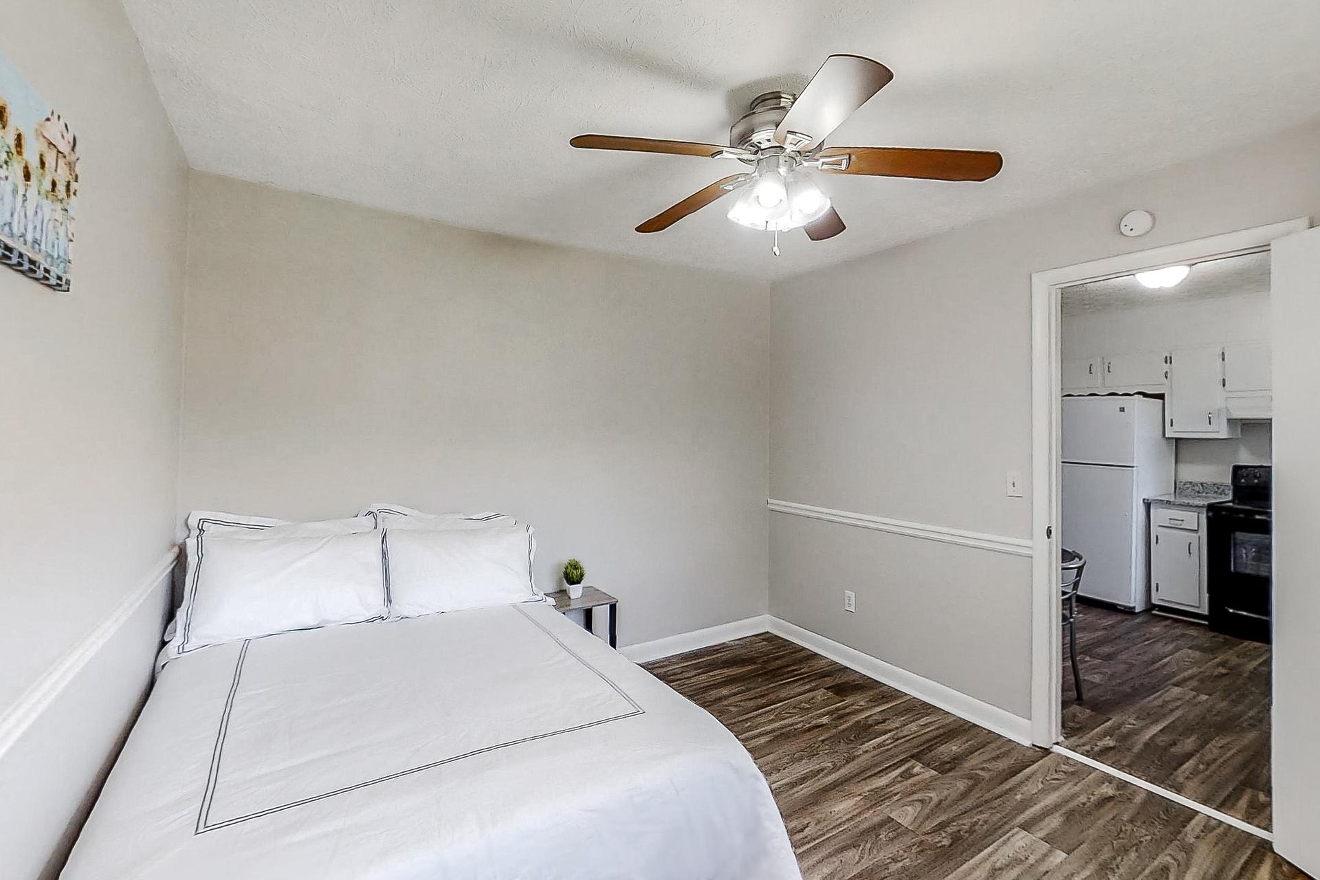 bedroom, detected: ceiling fan, bed, window blind