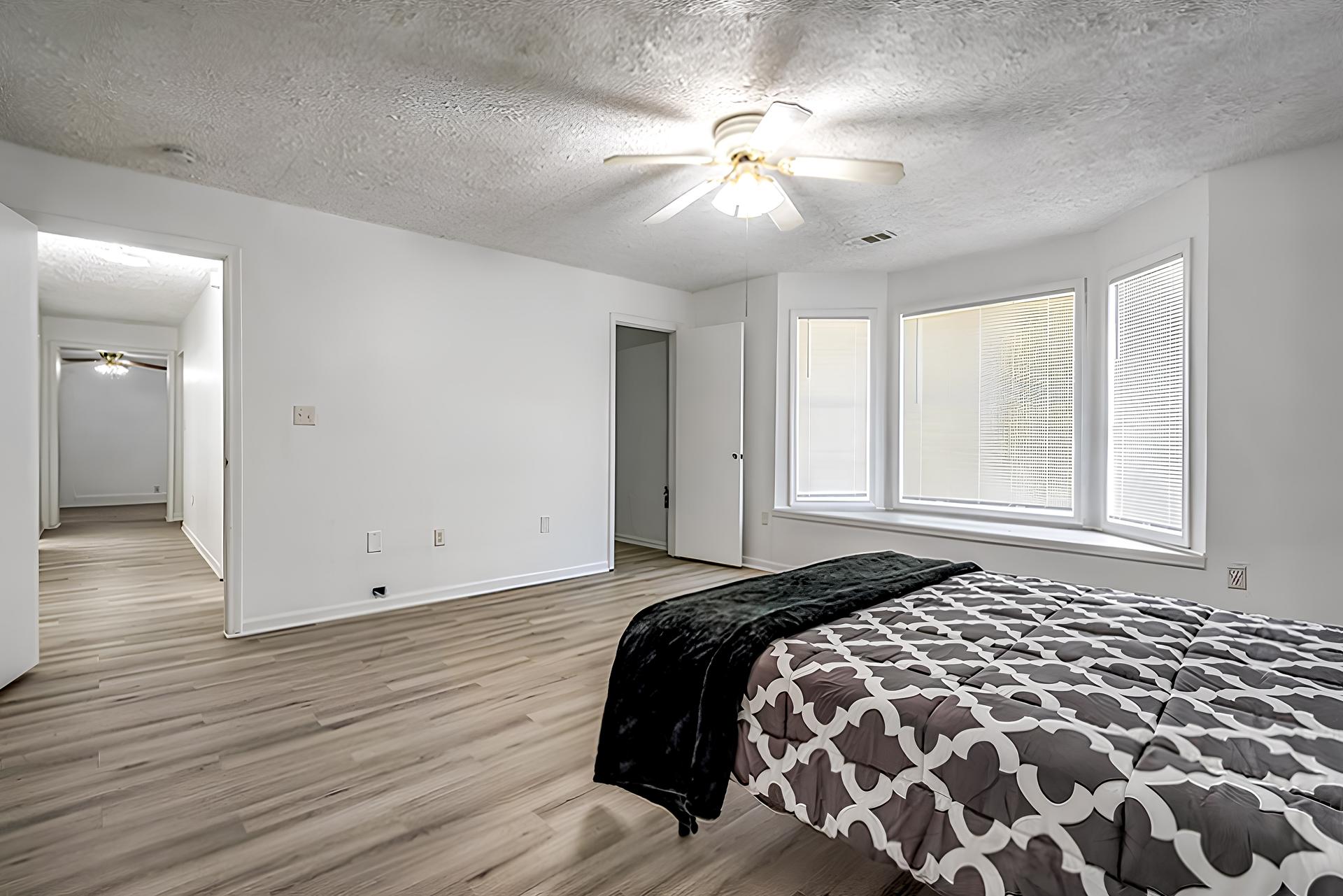 bedroom, detected: ceiling fan, window blind, bed
