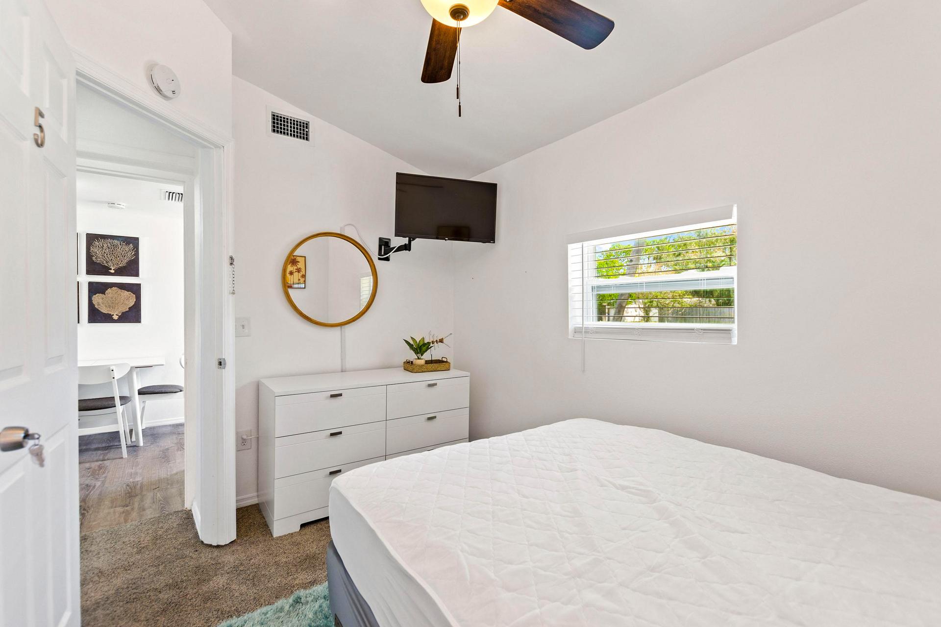 bedroom, detected: ceiling fan, bed, window blind