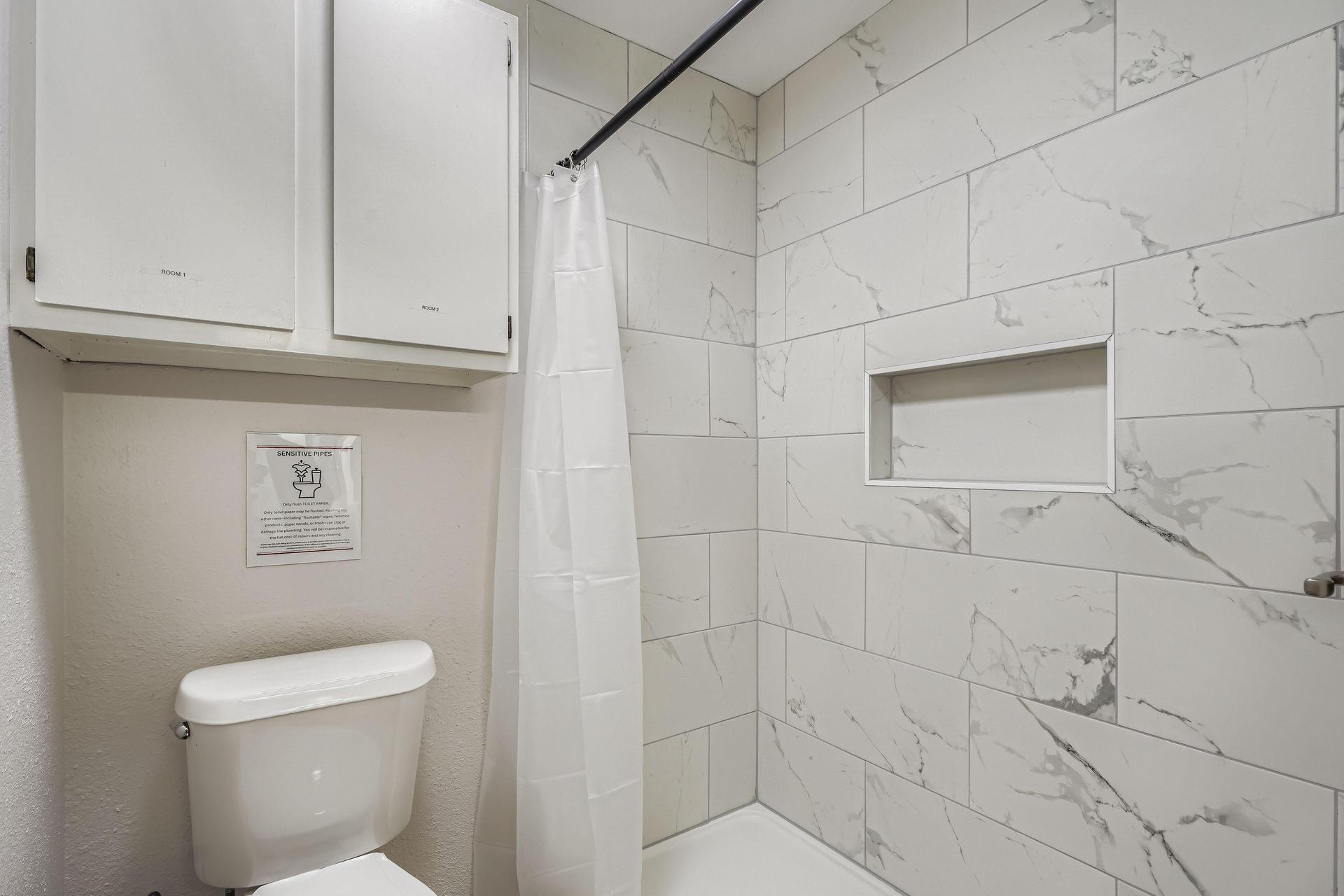 Newly renovated bathroom with spacious walk-in shower