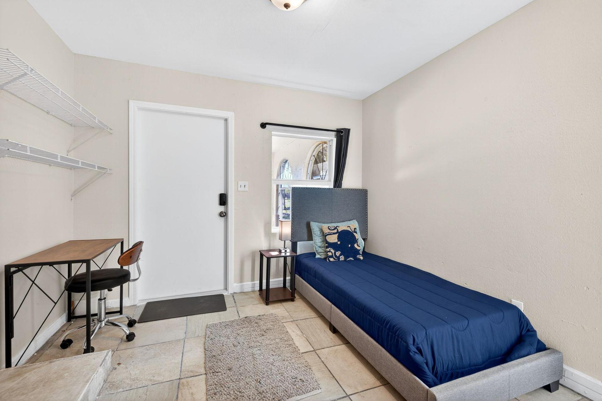 Bedroom #3 featuring a Twin-Size Bed and Private Entrance