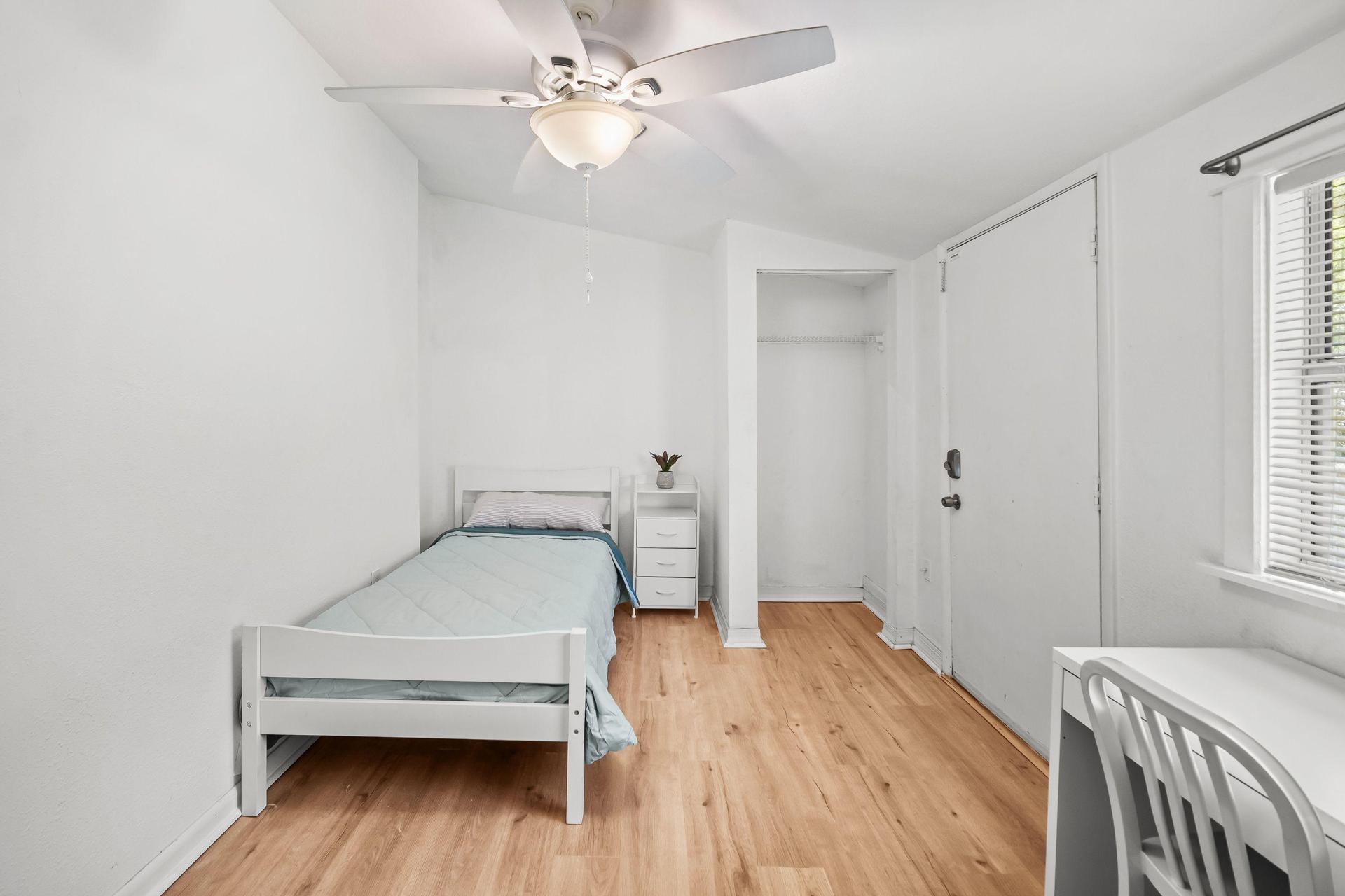 Nightstand and ceiling fan with closet space. Also includes separate entrance.