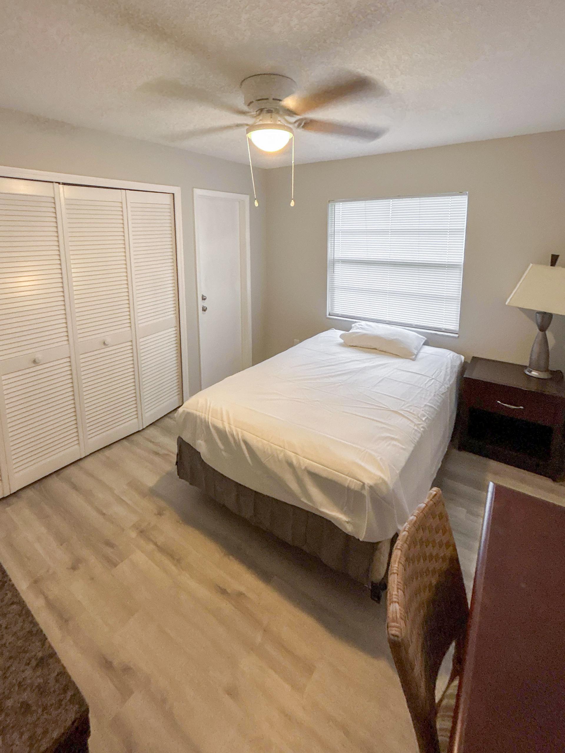 bedroom, detected:bed, ceiling fan, window blind