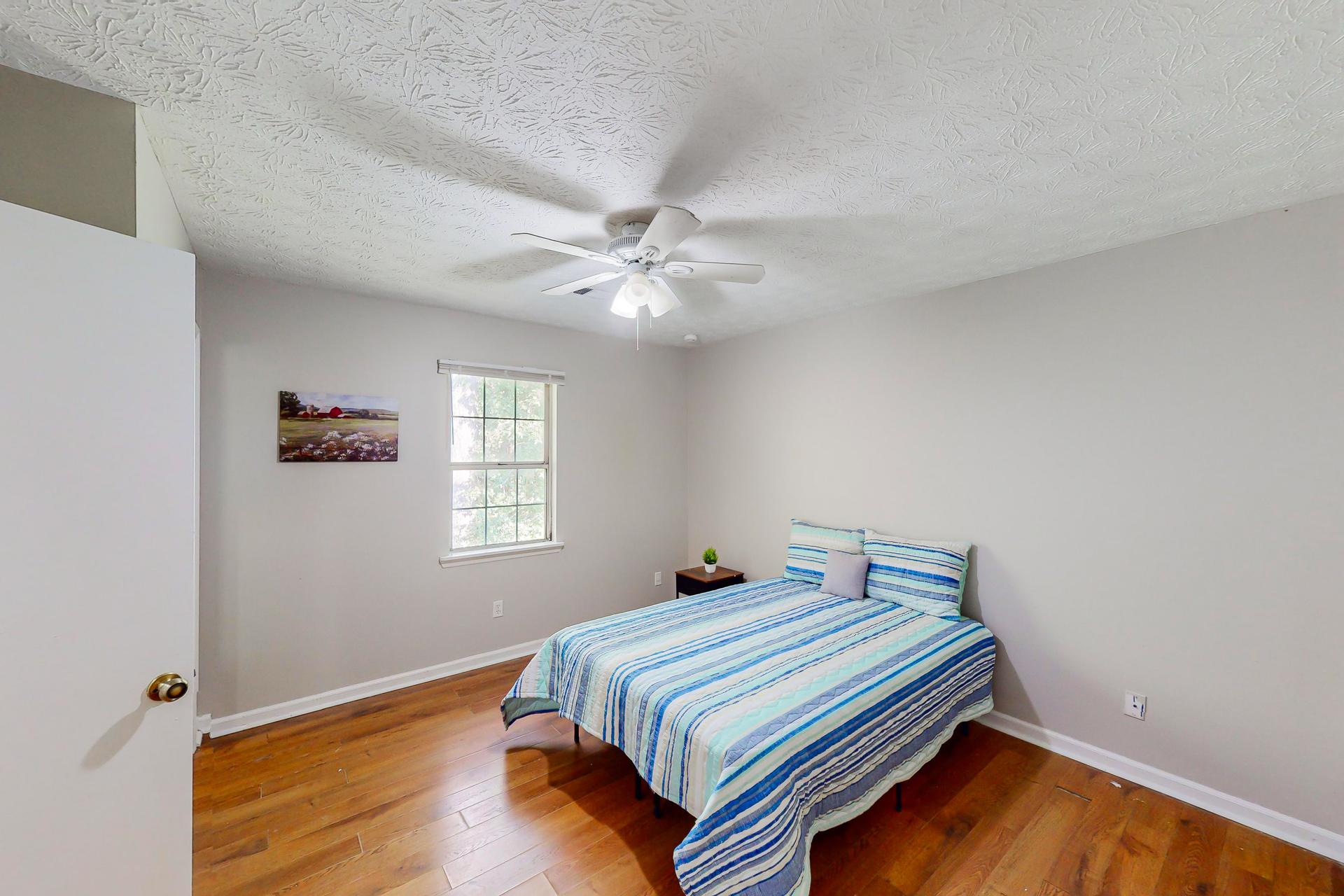 bedroom, detected:ceiling fan, window blind, bed