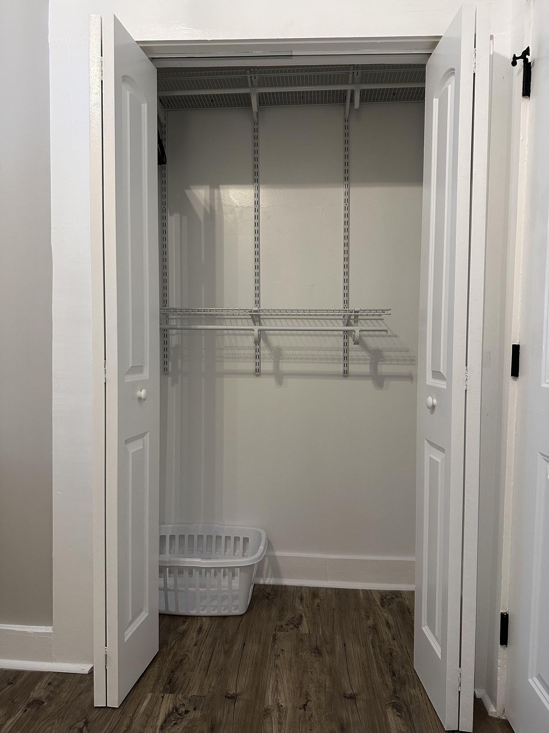 8 feet of closet shelving and hanging rod (total length for 2 levels)