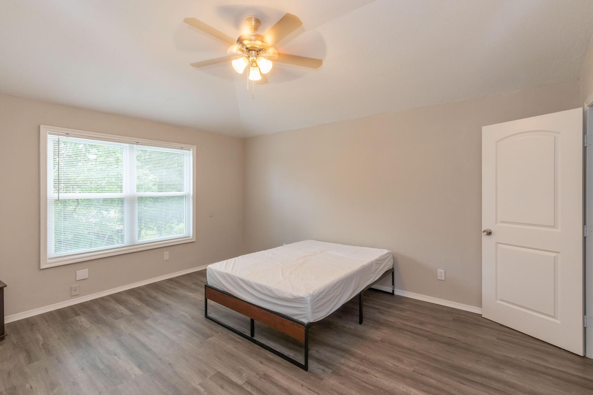 Spacious bedroom with high ceiling. 2nd floor