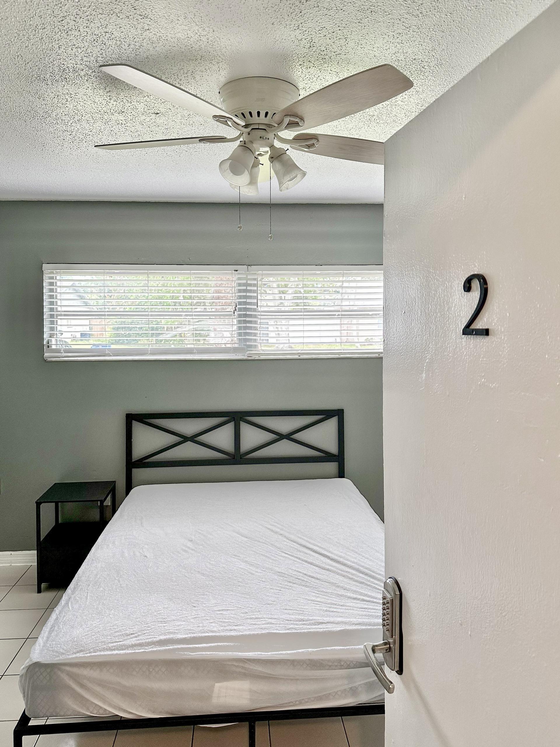 bedroom, detected:ceiling fan, window blind, bed