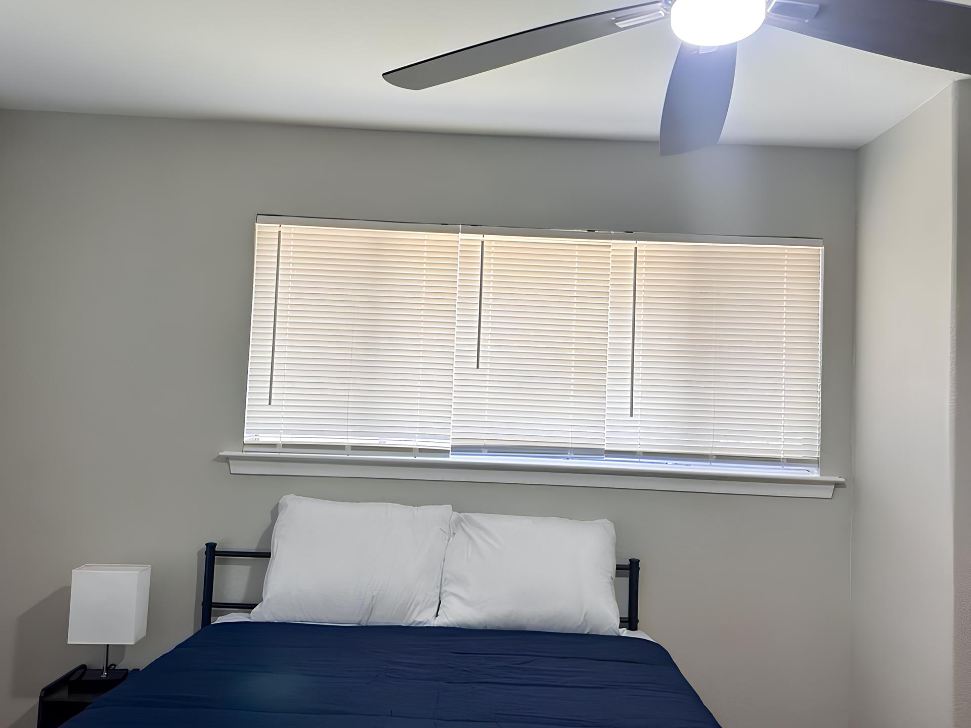 bedroom, detected:window blind, ceiling fan, bed