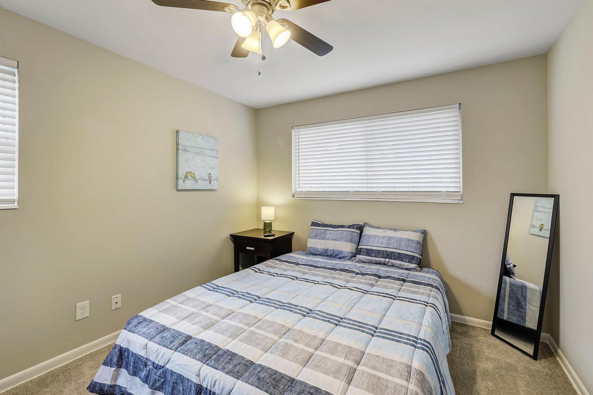 bedroom, detected:window blind, ceiling fan, bed