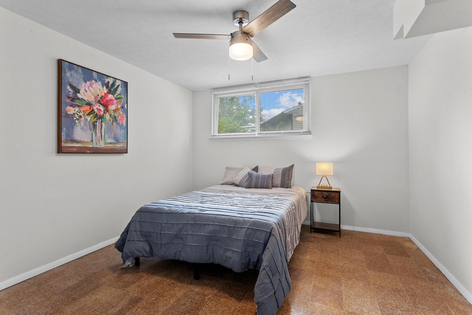 Great spacious basement room, quiet, with overhead fan