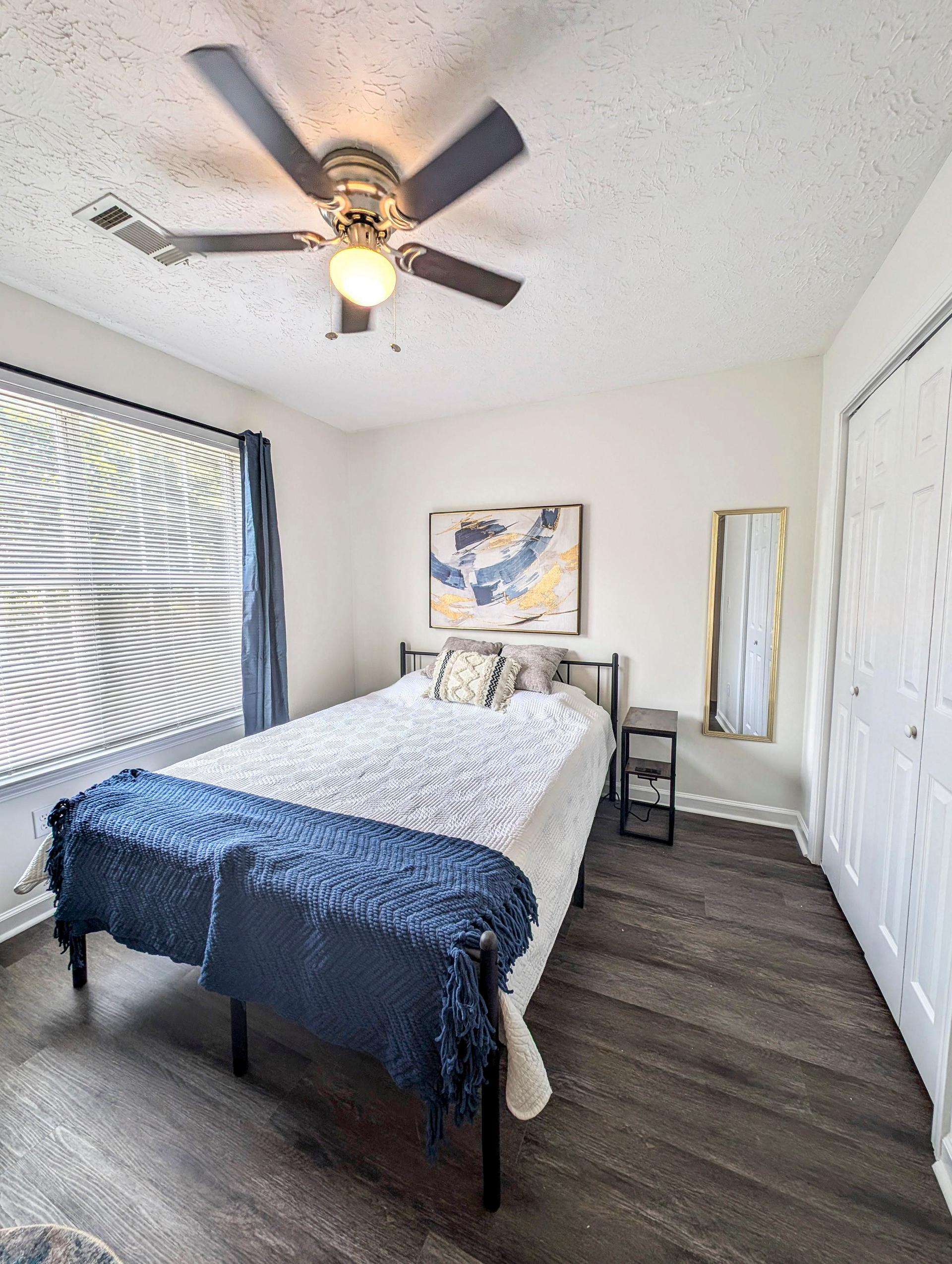 bedroom, detected:ceiling fan, bed, window blind