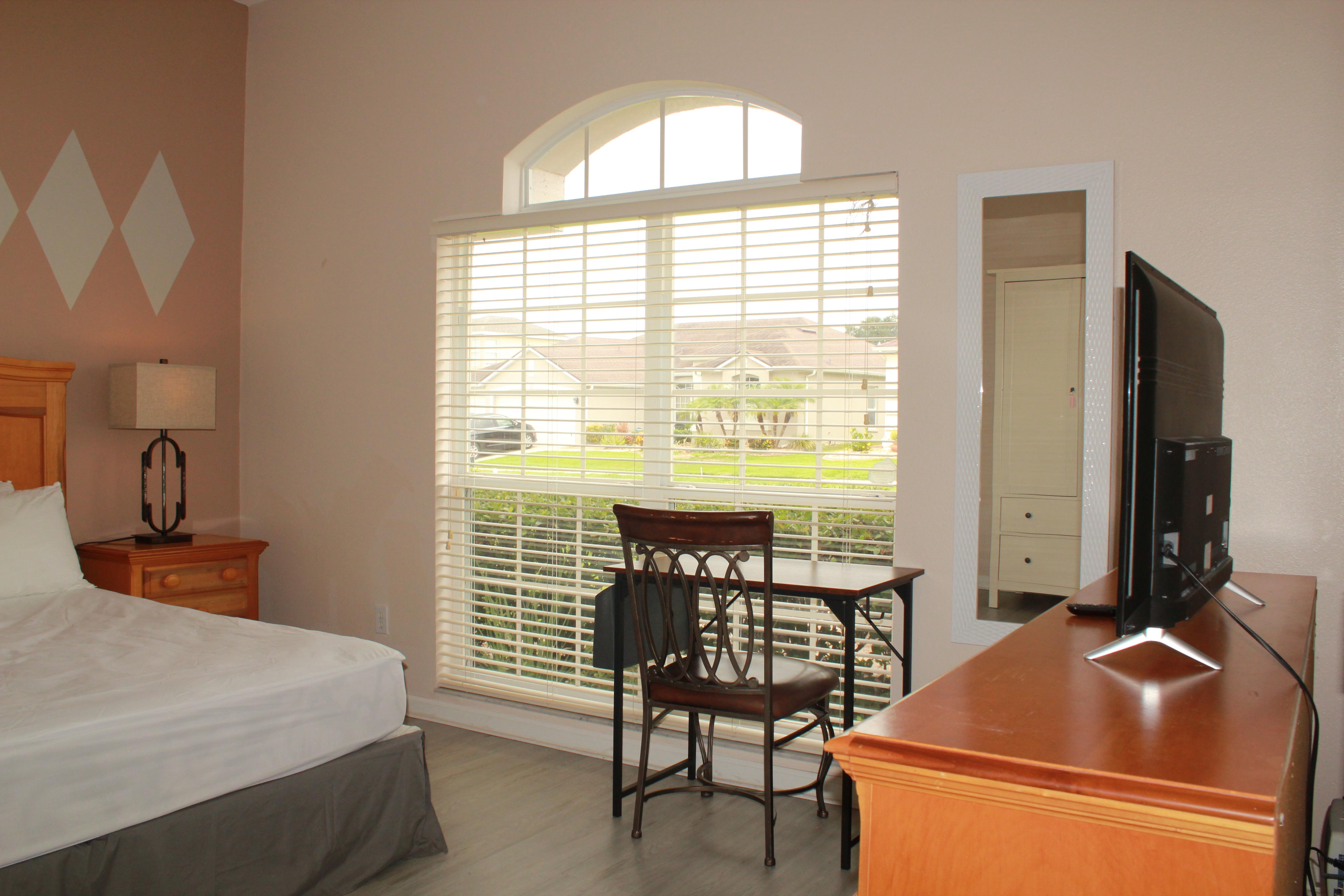 Room for Rent - Spacious Home with Private Pool Smart TV Workstation Mirror Vinyl Flooring Ceiling Fan