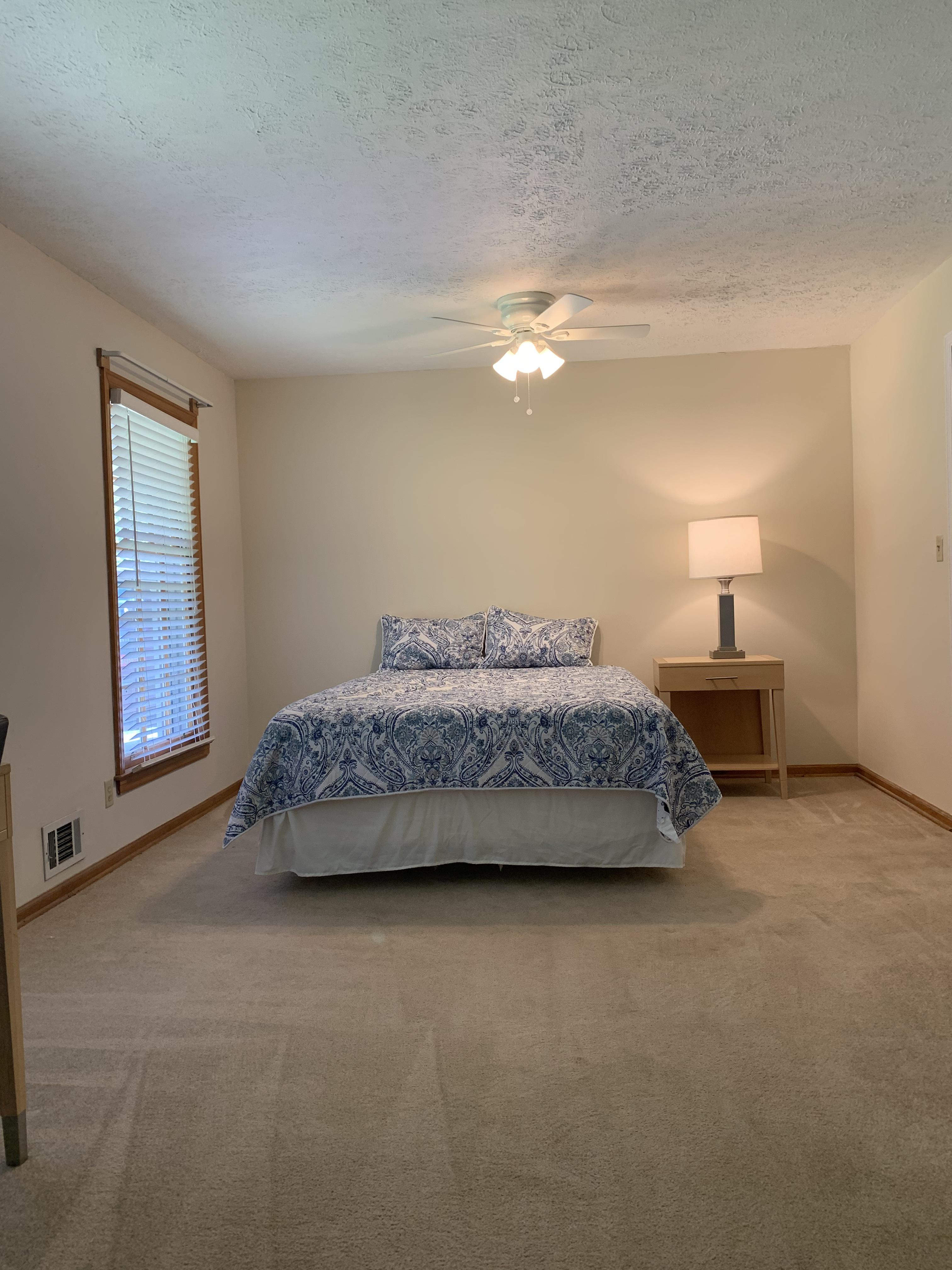 Ceiling fan and light above the bed for your comfort